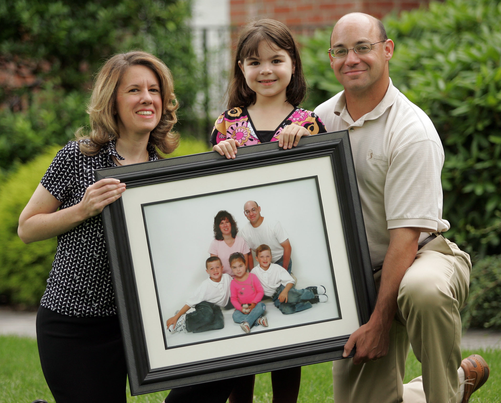 Melissa Brisman posing with Surrogate family